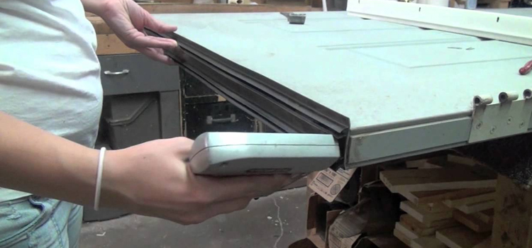 damaged steel door repair Huron